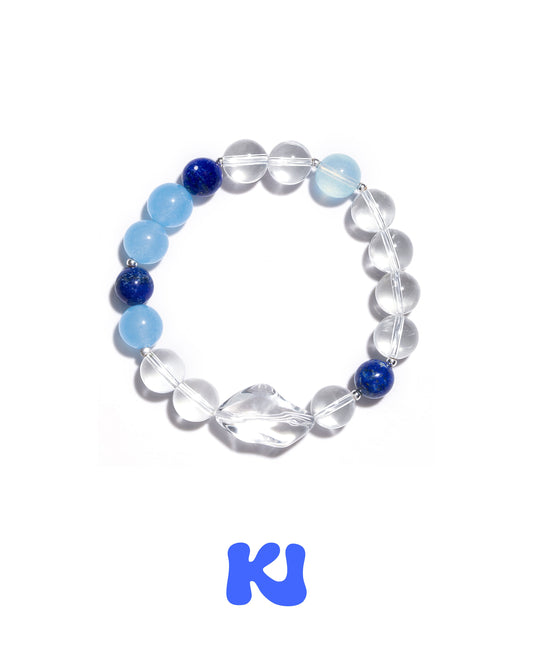 Crystal bead bracelet with clear beads and blue accent spheres