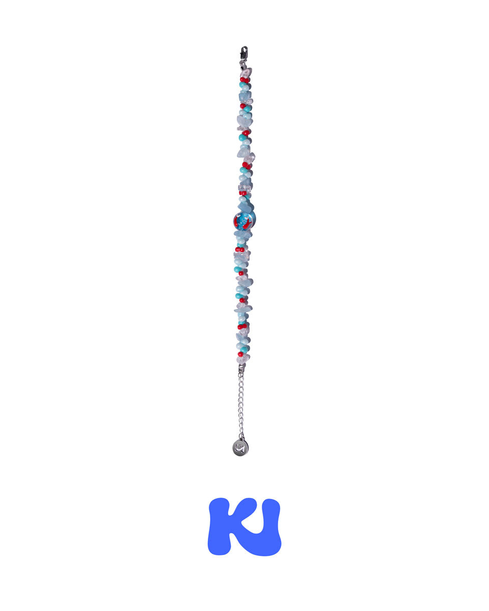 Beaded charm bracelet with multicolor glass beads, silver chain, and round metal clasp