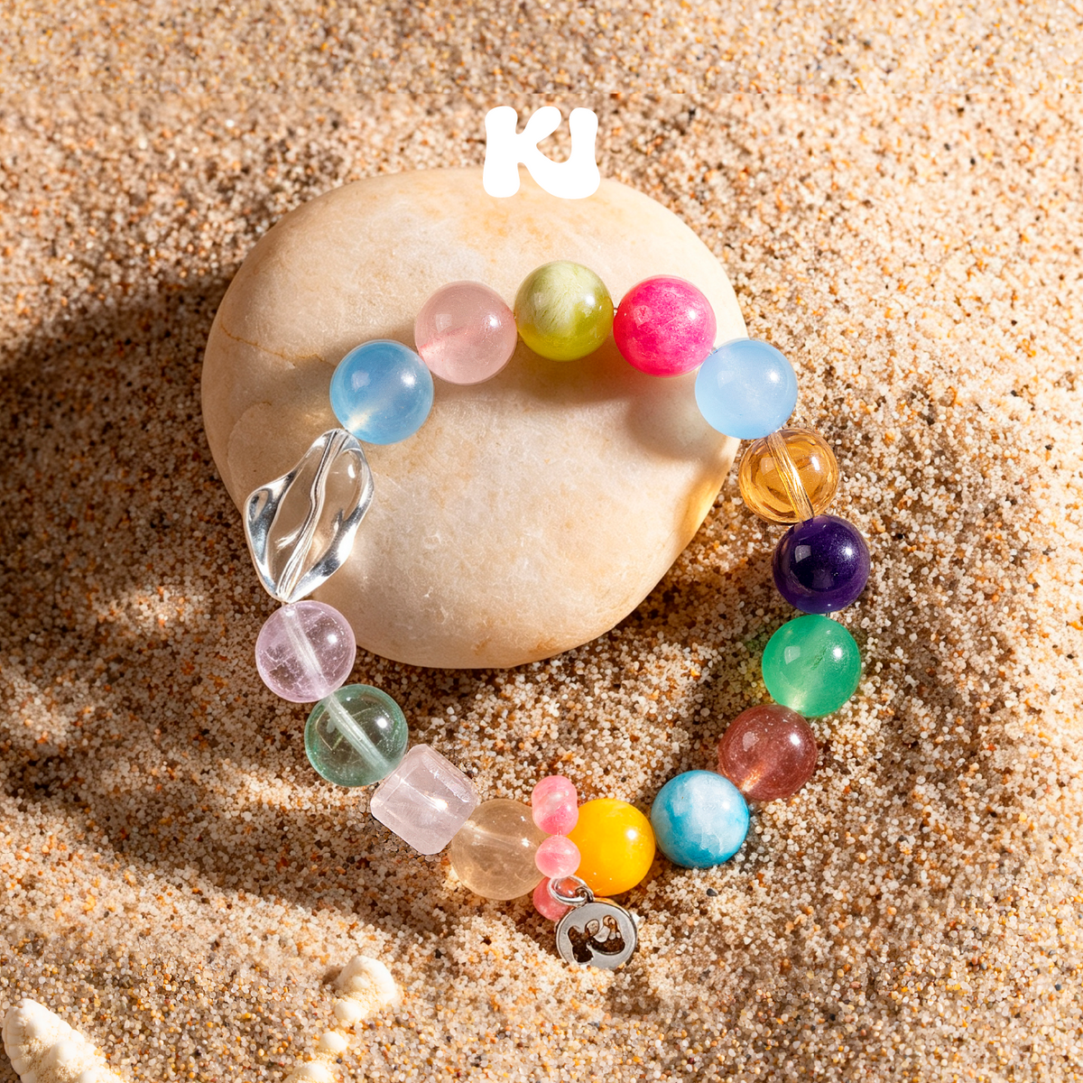 Rainbow crystal bracelet with multicolor round beads and silver-tone dangling charm