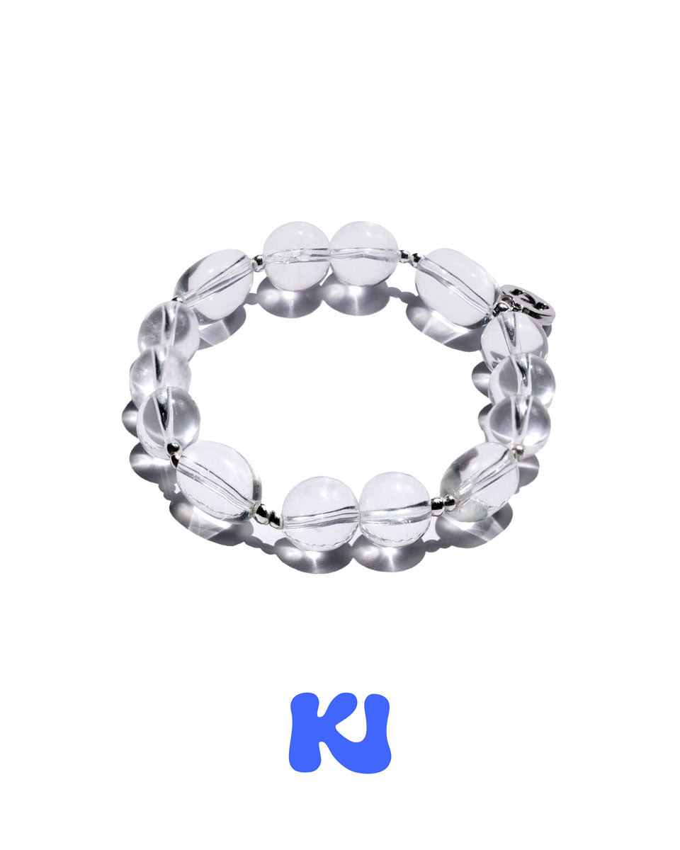 Clear oval bead bracelet with silver-toned links