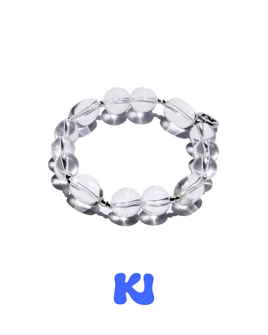 Clear oval bead bracelet with silver-toned links