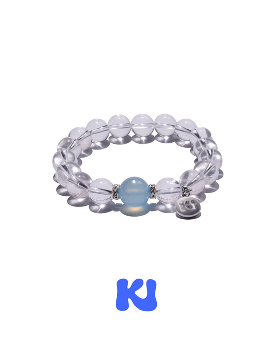 Silver-toned beaded bracelet with light blue center bead and black heart charm