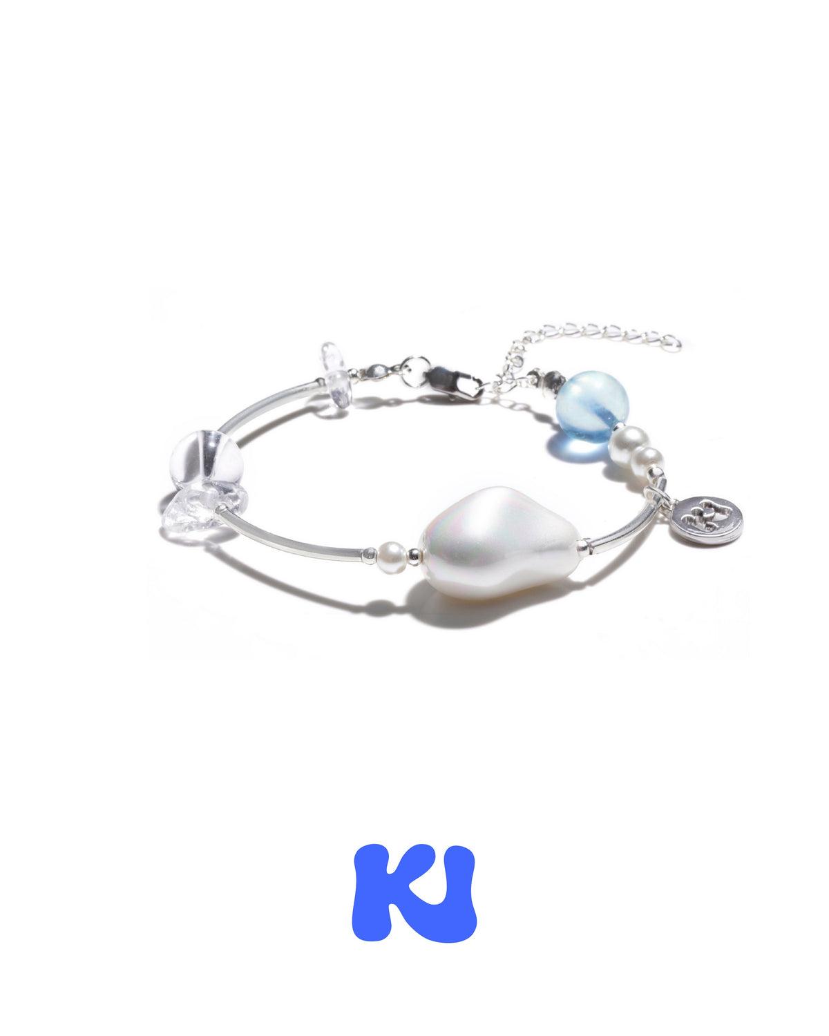 Crystal bracelet with silver-tone bangle, large iridescent bead and pale blue charm